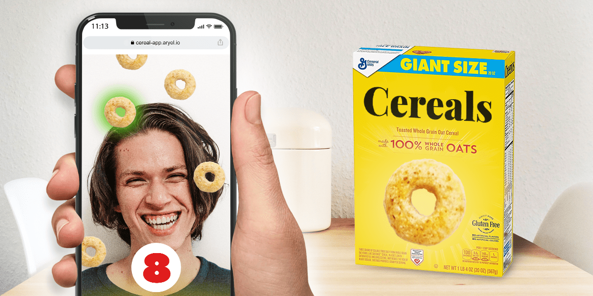 A guy experiencing an AR gamification experience near a box of cereals